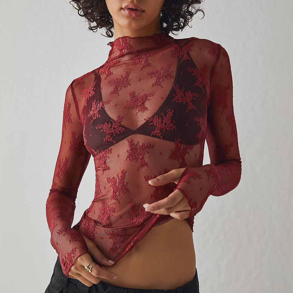 Top donna in pizzo trasparente a rete multicolore Valstrend, stile elegante e leggero, visibile con dettagli di tessuto e colori vivaci.