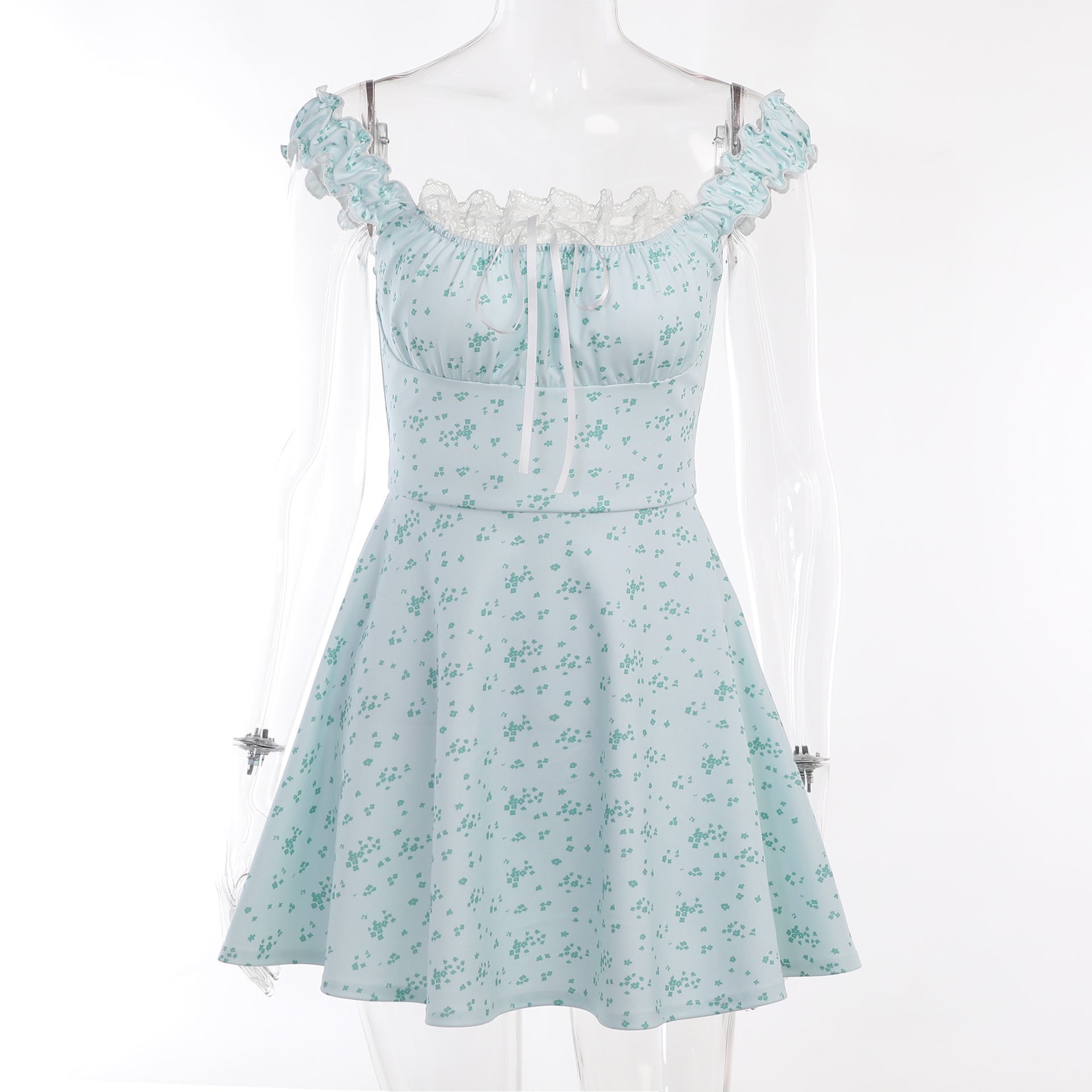 Vestito femminile aderente in vita con motivo floreale e bordo di pizzo, modello Valstrend, elegante e femminile.