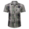 Camicia da uomo a maniche corte, vestibilità ampia, in tessuto leggero, marca Valstrend, visibile in dettaglio.