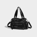 Borsa da moto vintage nera con cerniera Valstrend, stile fashion e design retrò, con dettagli in pelle e tracolla regolabile