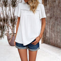 Top donna manica corta in patchwork colorato Valstrend, tessuto morbido e stile casual, vista frontale.
