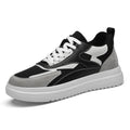 Scarpe bianche in mesh e cuoio con cuciture, modello Valstrend, stile alla moda e traspirante.