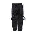 Salopette funzionale nera da uomo Valstrend con tasche multiple, stile skinny, ideale per lavoro e casual.