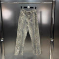 Jeans stretti a stampa leopardo Valstrend, stile street fashion, con taglio slim e linea dritta, visibili nell'immagine.