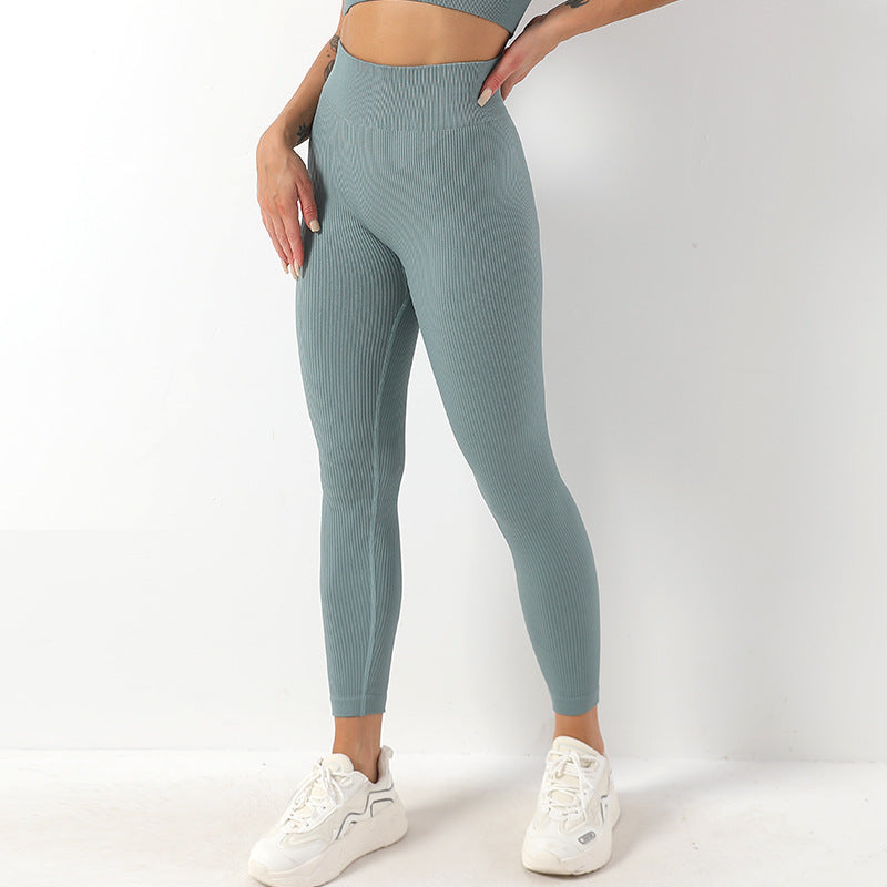 Pantaloni fitness stretch a vita alta Valstrend, in tessuto a trama europea e americana, color pesca, morbidi e comodi.