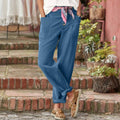 Pantaloni casual in cotone e lino per donna di Valstrend, modello ampio e comodo, con cintura e tasche, stile informale.