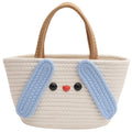 Borsa cartone con manico, stile artigianale, in tessuto a maglia, marchio Valstrend, dettagli colorati e design originale.