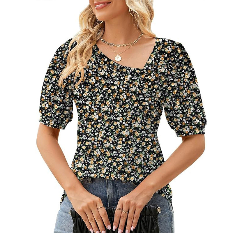 T-shirt donna a maniche corte con stampa floreale, maniche a sbuffo irregolari e vestibilità morbida, marca Valstrend.