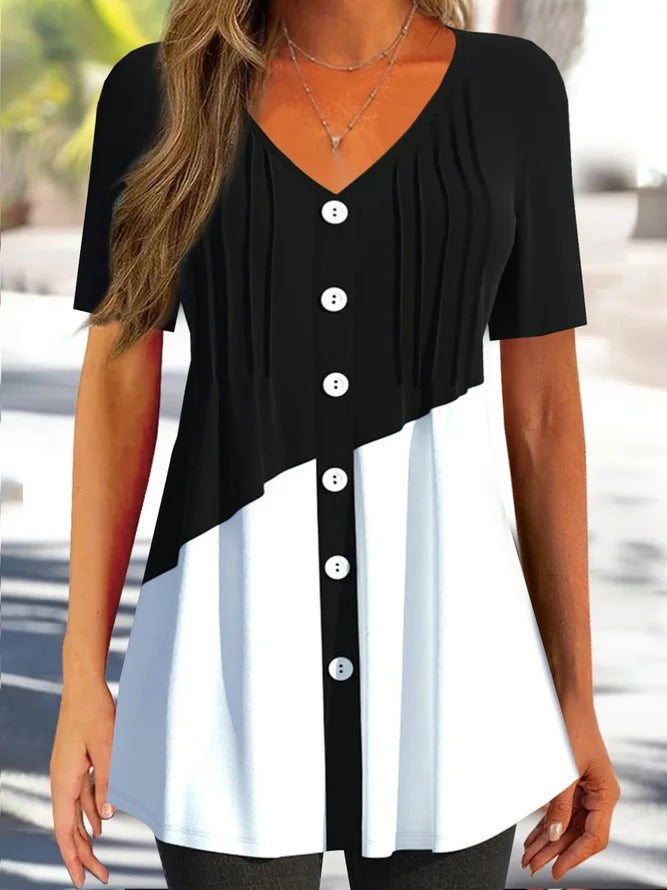 Top donna Valstrend in stile colorblock con bottoni e scollo a V, maglia fashion femminile con design colorato e moderno.