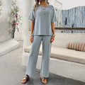 Completo di pantaloni a maniche corte in maglia colorata solida, stile Valstrend shop, tessuto morbido e confortevole.