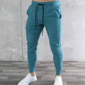Pantaloni jogger slim fit fitness da uomo Valstrend, versione coreana, in tessuto morbido e aderente, colore nero.
