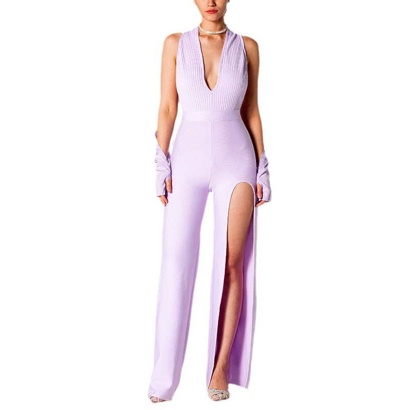 Comoda tuta estiva senza schiena Valstrend, con scollo a V, dettagli slit e forma slim, ideale per look estivi eleganti.