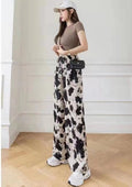 Pantaloni larghi in seta ghiaccio tie-dye con stampa a inchiostro per donna, stile estivo, firmati Valstrend.