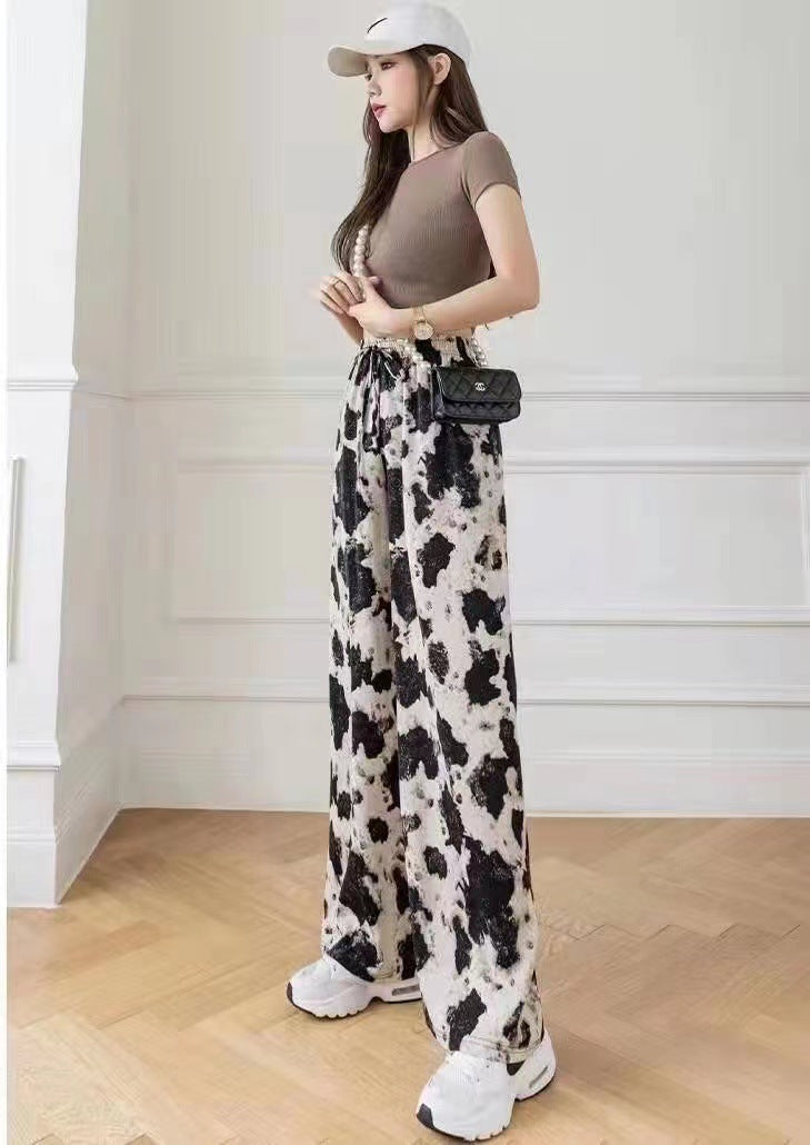 Pantaloni larghi in seta ghiaccio tie-dye con stampa a inchiostro per donna, stile estivo, firmati Valstrend.