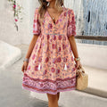 Vestito casual estivo floreale a maniche corte Valstrend, stampa a fiori, perfetto per le vacanze estive.