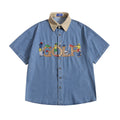 Camicia larga in jeans con ricami di lettere divertenti e stile cartoon, marca Valstrend shop, tessuto denim morbido e casual