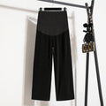 Pantaloni casual per donna in seta ghiaccio e vita elasticata, modello premaman, di Valstrend shop, con pieghe eleganti.