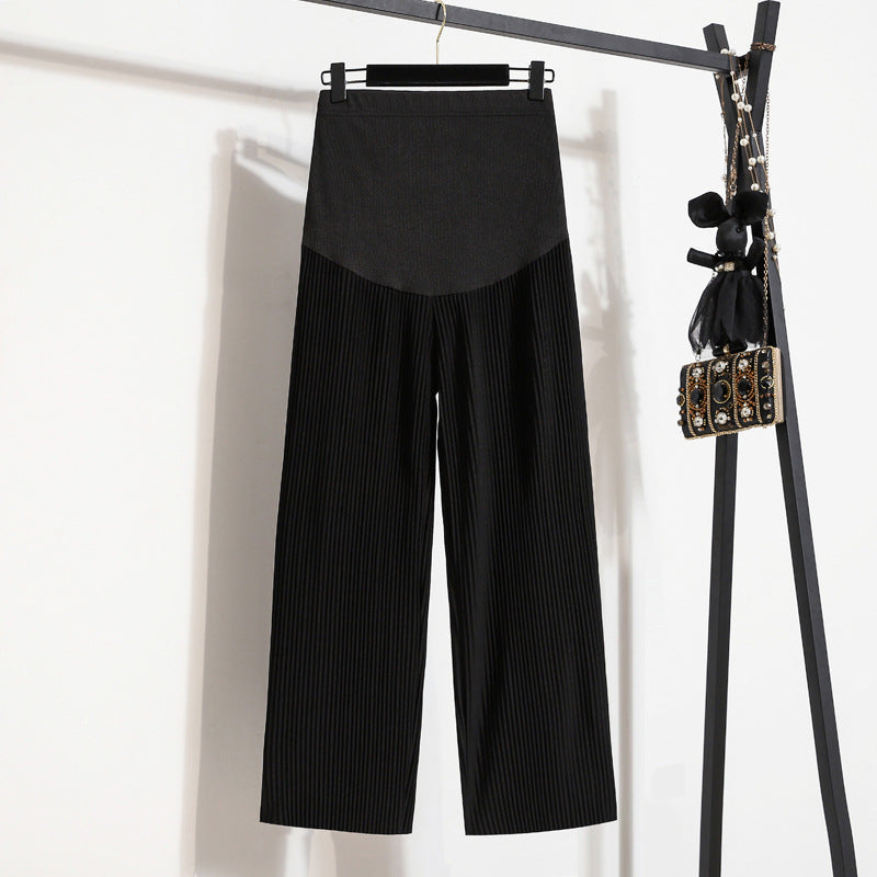 Pantaloni casual per donna in seta ghiaccio e vita elasticata, modello premaman, di Valstrend shop, con pieghe eleganti.