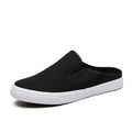 Scarpe da uomo Valstrend slip-on con punta chiusa in canvas nero, stile casual e comodo per l'uso quotidiano.