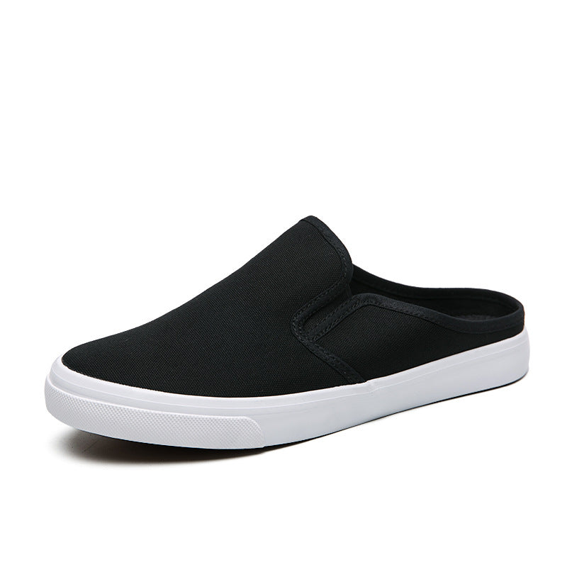 Scarpe da uomo Valstrend slip-on con punta chiusa in canvas nero, stile casual e comodo per l'uso quotidiano.