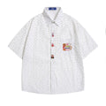 Camicia corta con stampa floreale per ragazzi Valstrend, stile americano, maniche corte e design colorato.