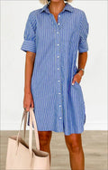 Abito femminile a righe con tasche e chiusura monobottone, stile trench leggero di Valstrend.