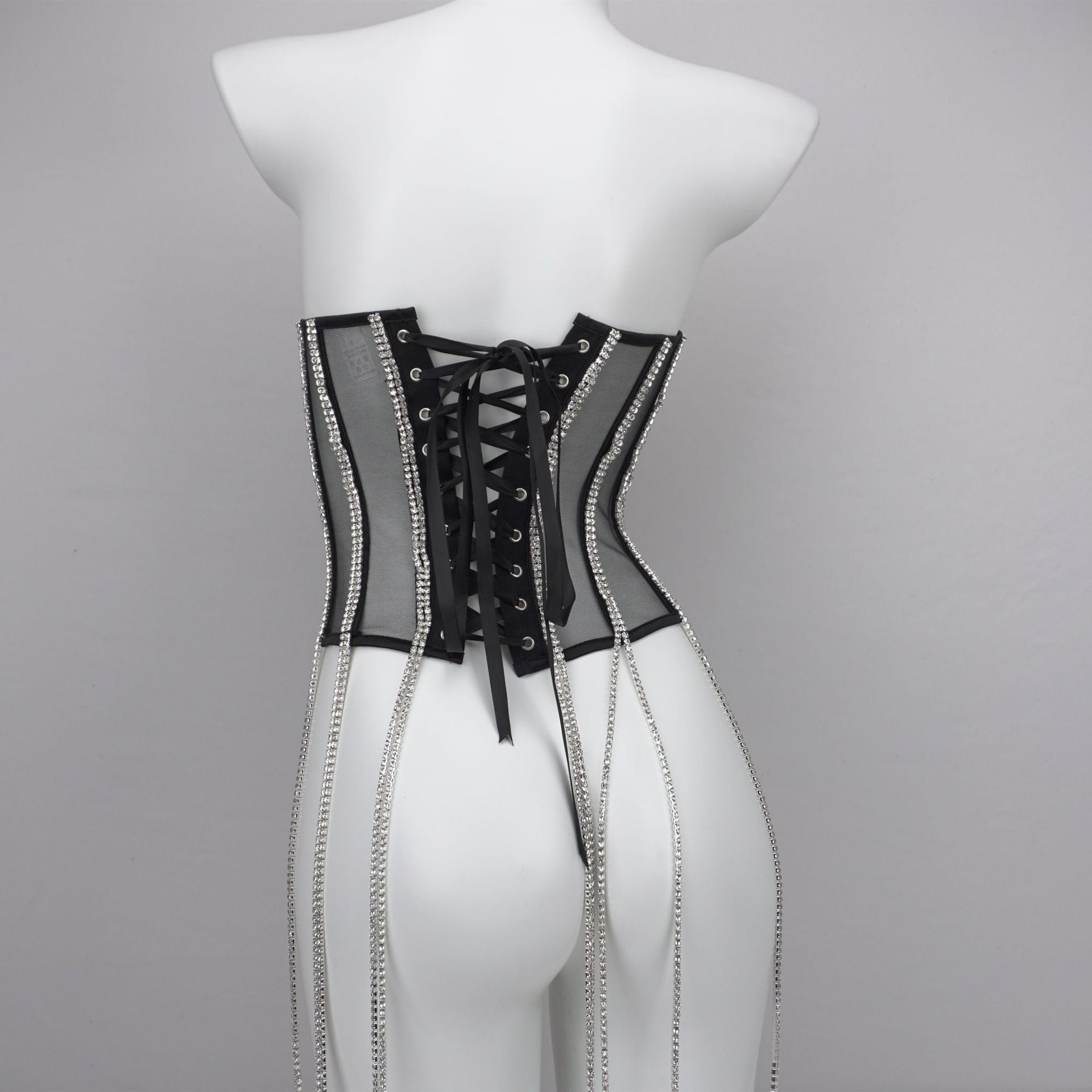 Reggiseno modellante donna in poliestere nero con catena, marchio Valstrend shop, vista frontale.