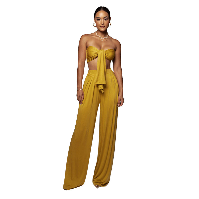 Completo donna Valstrend, top tubo color solido e pantaloni a vita media a zampa larga, stile casual elegante.