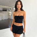 Completo estivo da donna Valstrend, top senza maniche e gonna plissettata, stile Y2K e moda hot girl, abbigliamento alla moda.