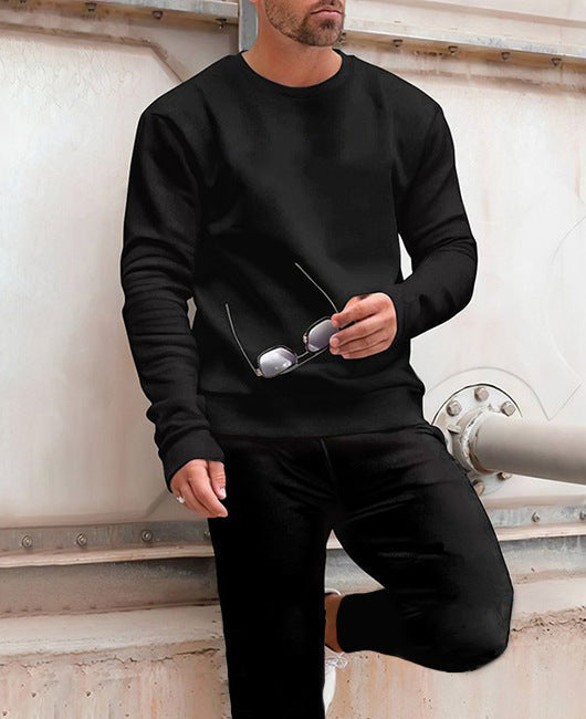 Completo da uomo Valstrend con maglione a girocollo e pantaloni in tessuto stampato a colori solidi.