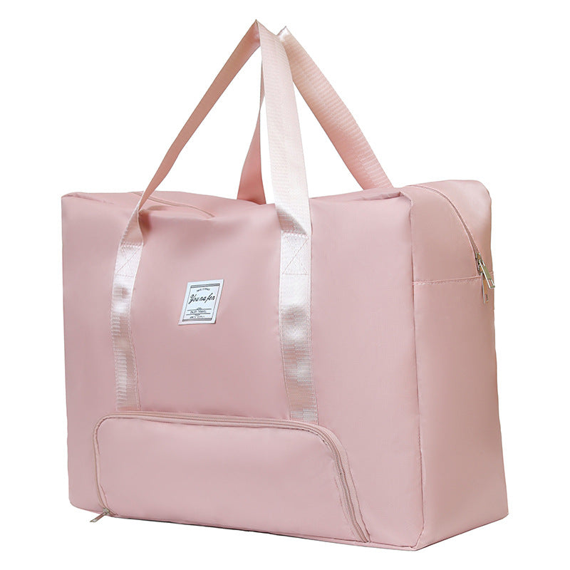Borsa da viaggio portatile Valstrend grande capacità, con scomparti spaziosi e manici robusti, ideale per viaggi e trasferimenti.