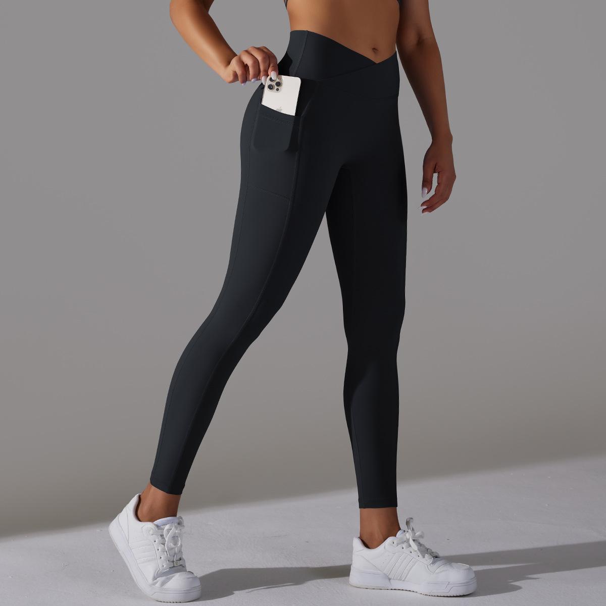 Pantaloni sportivi Valstrend Nude Feel con vita alta, tasche laterali e tessuto elasticizzato per fitness e allenamenti.