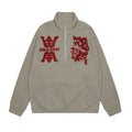Maglione con collo a stand e ricamo a motivo creativo, prodotto Valstrend con design elegante e dettagli ricamati.