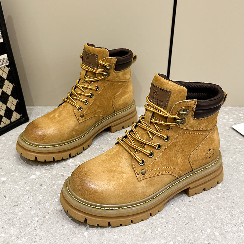 Stivaletti biker retro Dr Martens donna con tacco nascosto e piattaforma, stile unico e robusto, in pelle nera.