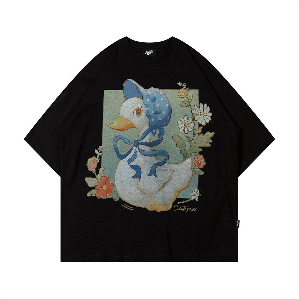 Maglietta a maniche corte in cotone con stampa cartone animato di paperotto, marca Valstrend shop, vista frontale.