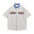 Camicia larga con maniche corte valstrend con ricamo di orso cartoon a righe pinstripe, stile casual e divertente