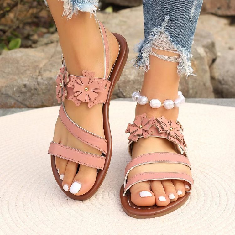 Sandali flat con fiori per donna taglia grande Valstrend, calzature estive eleganti e comode con dettagli floreali colorati.
