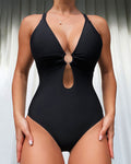 Costume da bagno intero donna Valstrend con scollo a V profondo, ferretto e laccetto, tessuto elastico e confortevole.