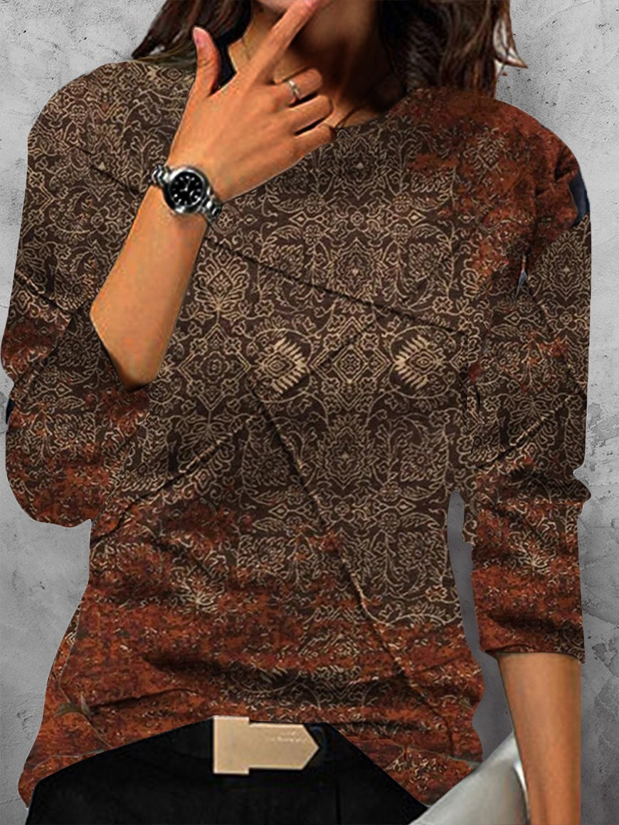 Maglione casual a girocollo con maniche lunghe e stampa digitale, modello femminile Valstrend, vestibilità ampia e comoda.