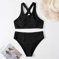Costume da bagno bikini da donna Valstrend, costume intero a tinta unita con spalline incrociate e taglio elegante.