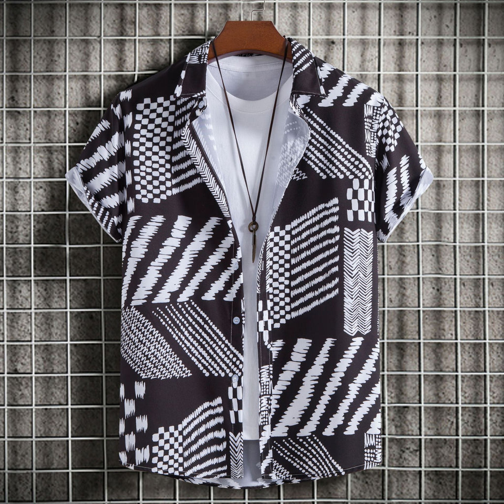 Camicia uomo slim fit stampata a maniche corte Valstrend, dettaglio di stampa colorata e tessuto leggero di moda maschile.
