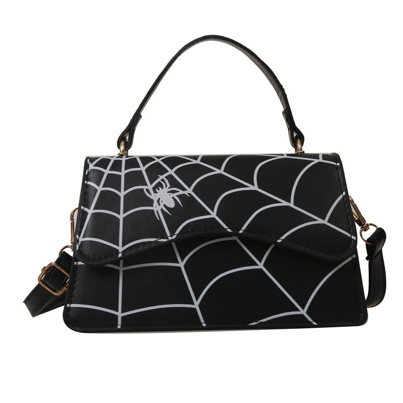 Borsa a tracolla Valstrend con stampa a ragnatela, stile fashion, ideale per un look casual e moderno, vista dall’immagine.