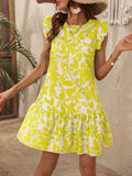 Vestito da donna Valstrend con collo rotondo, stampa e balze, tessuto leggero e femminile adatto per occasioni estive.