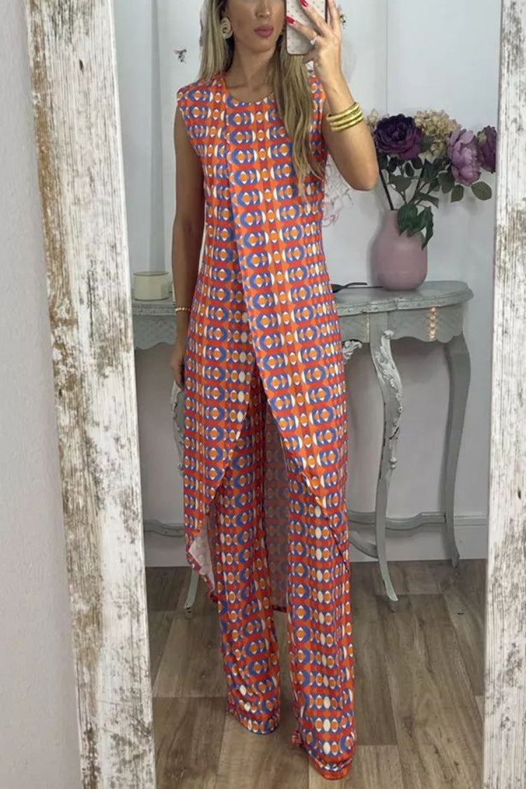 Completo da donna Valstrend con top senza maniche a stampa floreale e pantaloni a vestito con spacchi, stile elegante e alla moda.
