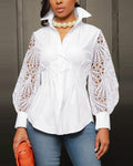 Maglione da donna Valstrend con maniche a sbuffo e stile fashion, indossato in un outfit casual e alla moda.