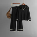 Completo donna Valstrend con giacca a contrasto e vita alta, stile moda elegante e alla moda, dettagli visibili nell'immagine.