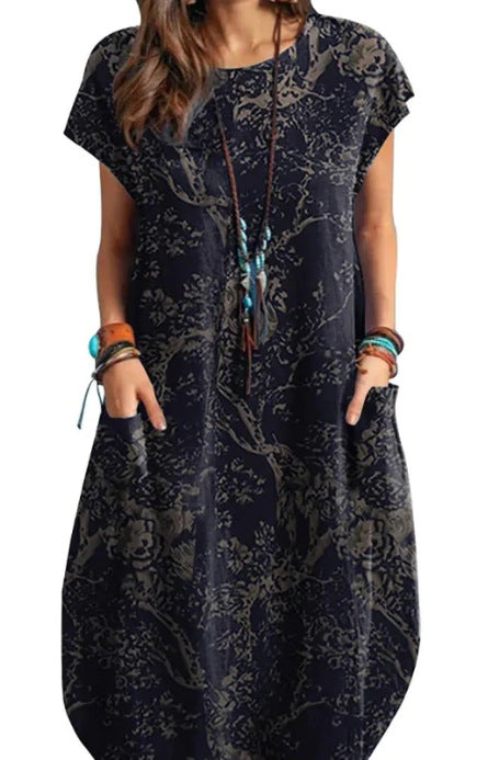 Vestito donna Valstrend con stampa, maniche corte e scollo rotondo, stile casual e alla moda, tessuto leggero e comodo.