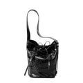 Borsa a secchiello Valstrend in pelle con manico a pattern speciale, tracolla singola e stile alla moda.