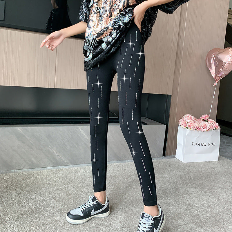 Leggings lucidi con strass per donna, dettagli scintillanti, modello aderente, firmati Valstrend shop.