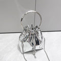 Borsa a tracolla da donna Valstrend in metallo con catena, stile messenger, con dettagli lucidi e elegante.